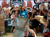 litl'xaidaga Ginawaan displaying a copper at Raven Always Sets Things Right potlatch, Yahgulaanaas/Janaas clan of the Haida