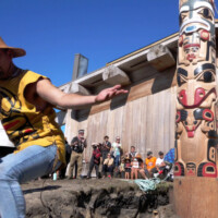 An apprentice carver dances to celebrate the raising of the new pole Tluu Xaada Nay, carved by Yahgulaanas master carver Christian White (Kihlyahda) and apprentices during the Covid lockdown years
Old Massett 2022 carver dancing, Tluu Xaada Nay Pole raising, Old Massett 2022